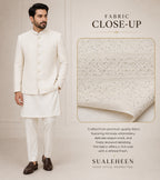 Close-up of ivory white embroidered fabric used for Sualeheen Prince Coat