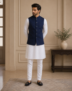Full-length model styling Sualeheen navy blue classic waistcoat with white kurta pajama
